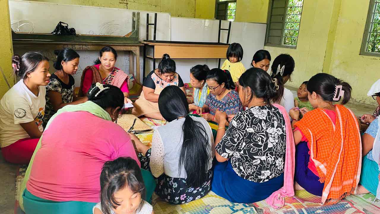 Internally displaced women making dolls to earn some extra money under Project Hope